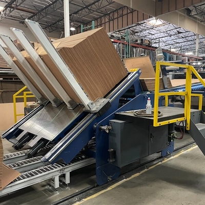 Machine de pré-alimentation fiable et précise équipée d'un mécanisme de levage de plateforme