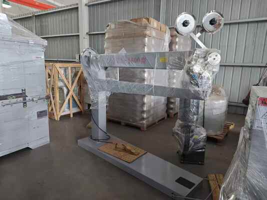 Machine à coudre manuelle pour boîtes en carton DZX1800 avec fonctionnement rotatif stable, haute vitesse 250/min et longueur de 1800 mm pour une efficacité d'emballage